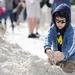 Michigan fan Owen Tunney, 5, of Saginaw, plays in the sand during beach day in Clearwater, Fla. on Sunday, Dec. 30. Melanie Maxwell I AnnArbor.com